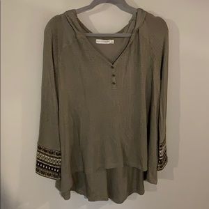 Green hooded sweater
